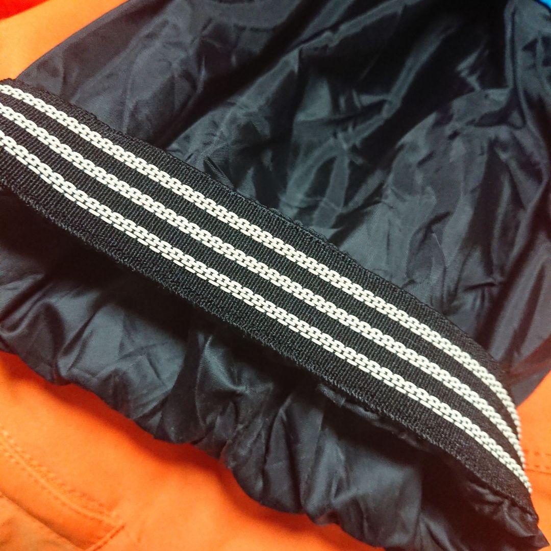 送料無料【MIZUNO】オレンジ無地スキーパンツ M