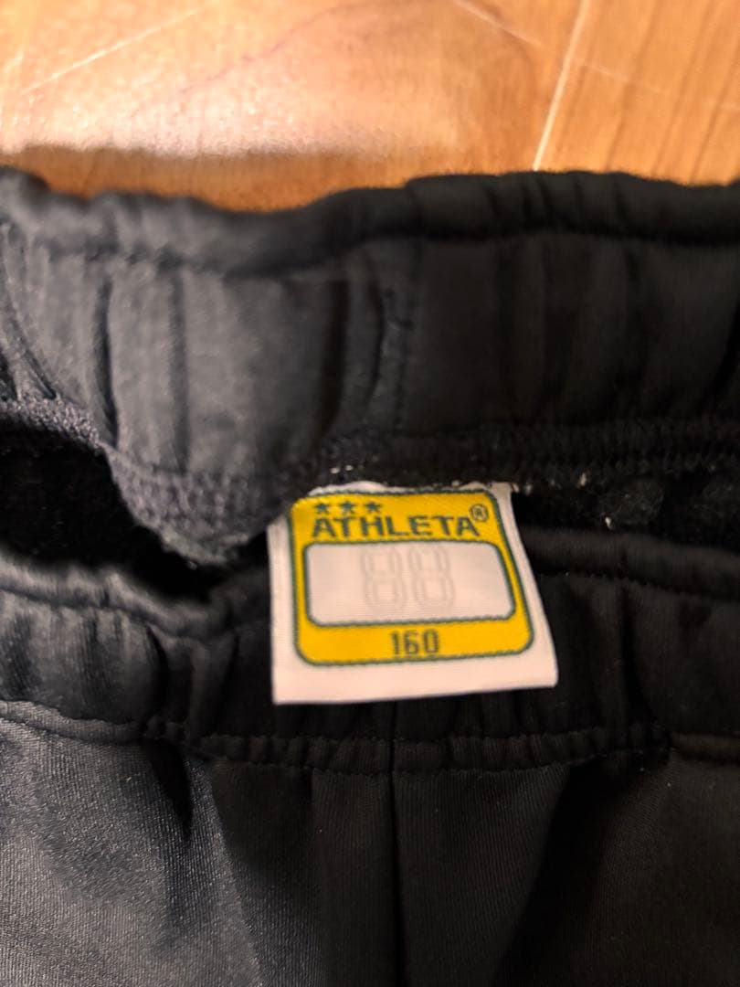 まとめ売りATHLETA ピステ ウィンドブレーカー 160 ネイビー/ブラック