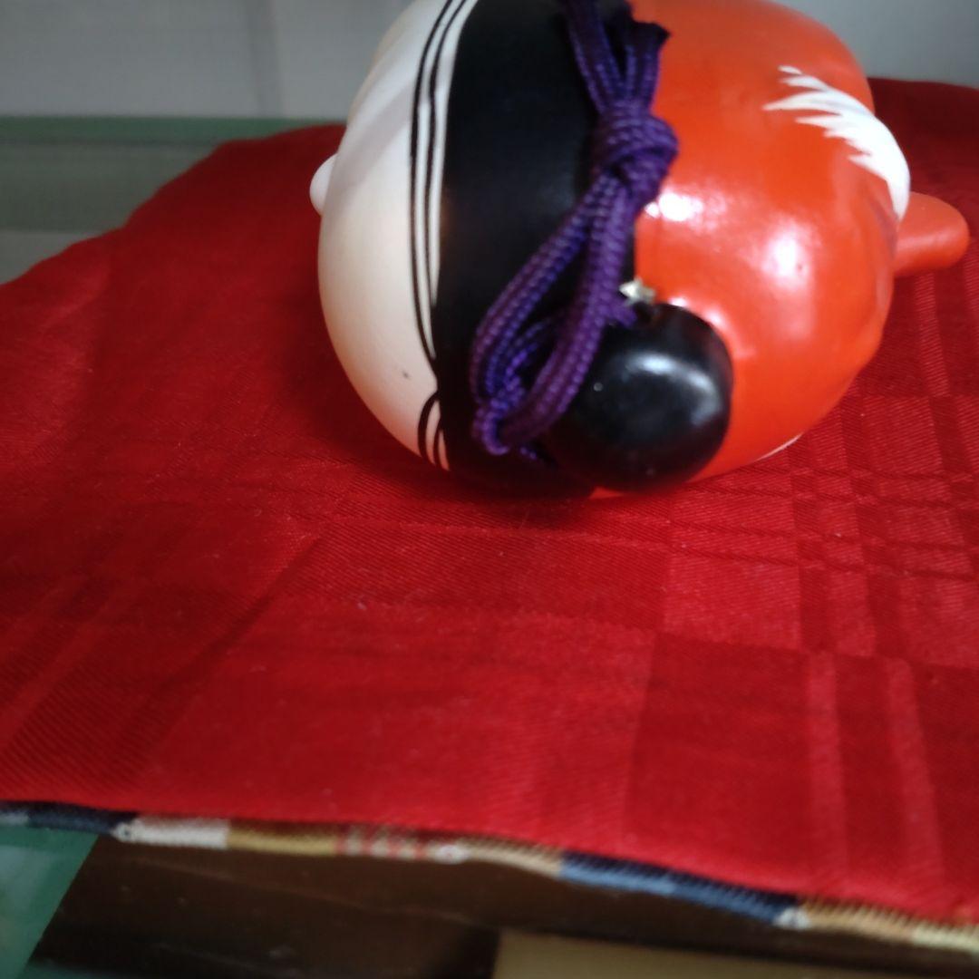 昭和の土鈴伝統的な女面と天狗の二面