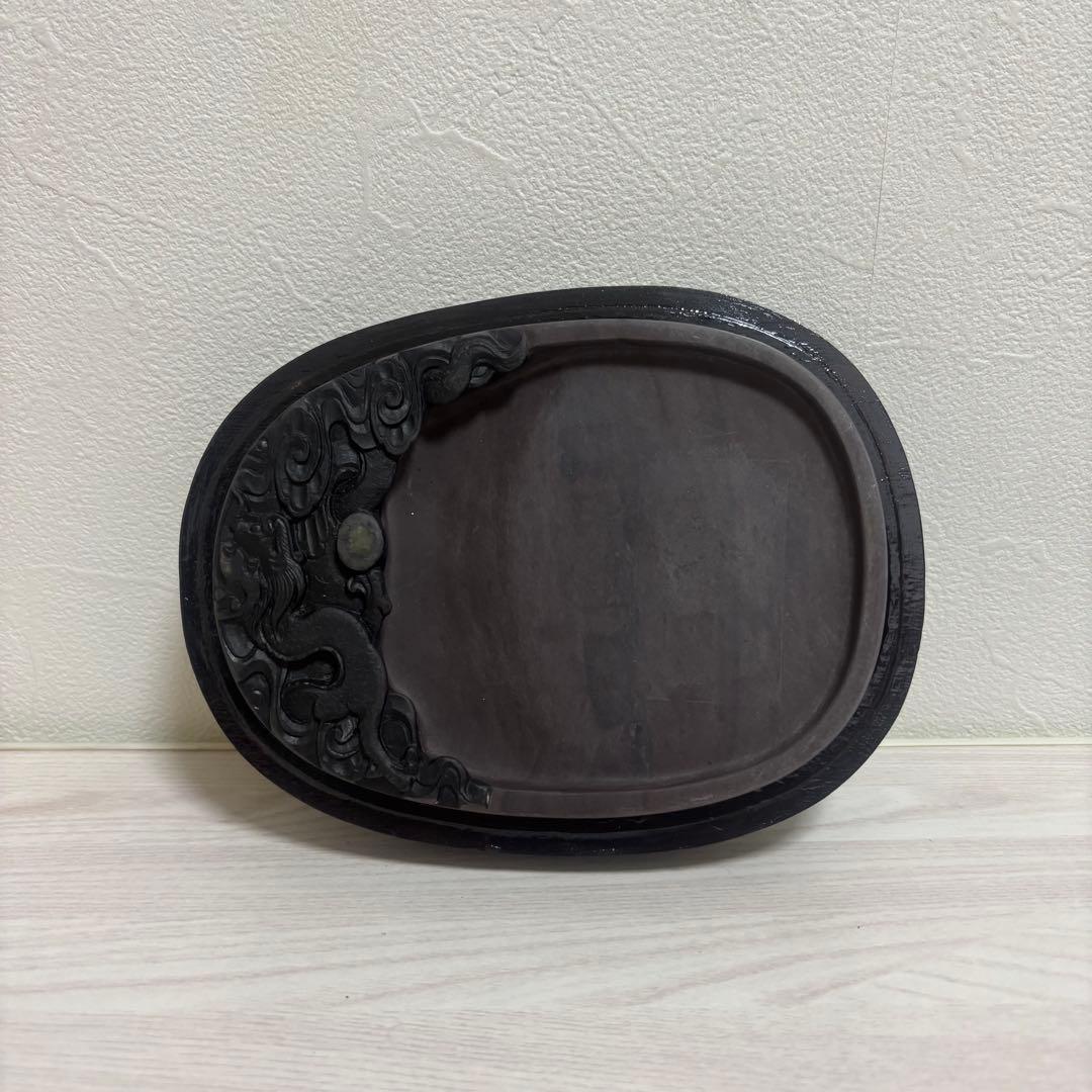 黒色の楕円形硯箱 金色の文字付き