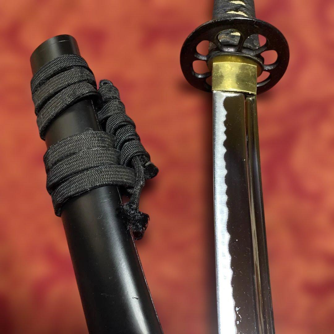 高級居合刀 黒柄 蓮根輪切透し丸鍔 黒呂鞘