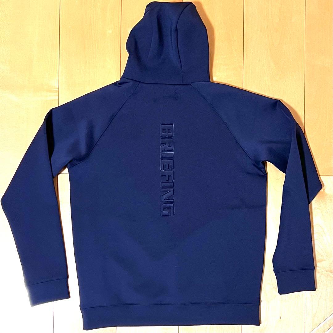 新品タグ付ブリーフィングゴルフ 3Dロゴ ハイストレッチ両サイドポケットフーディ