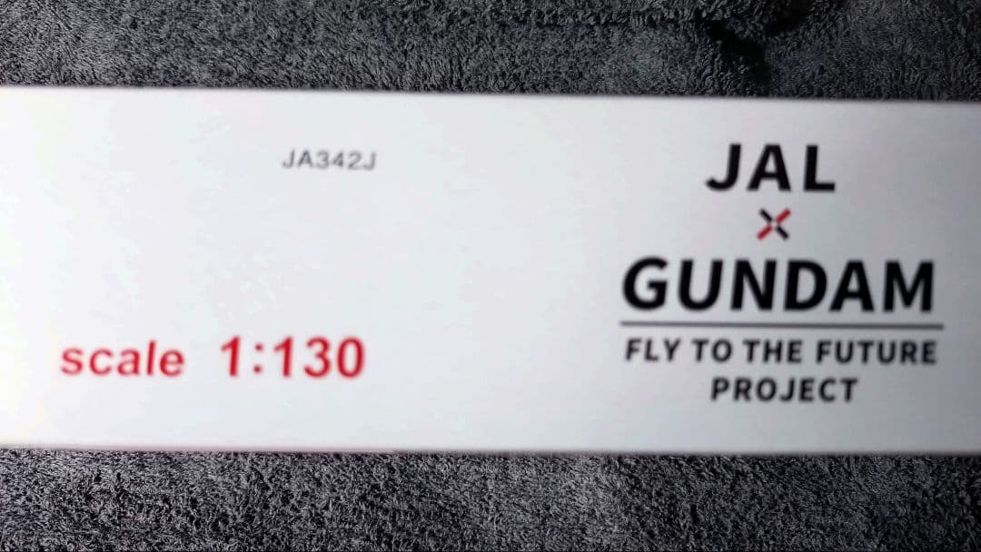 日本航空 ミャクミャク仕様「JALガンダムJET」モデルプレーン木製台座付