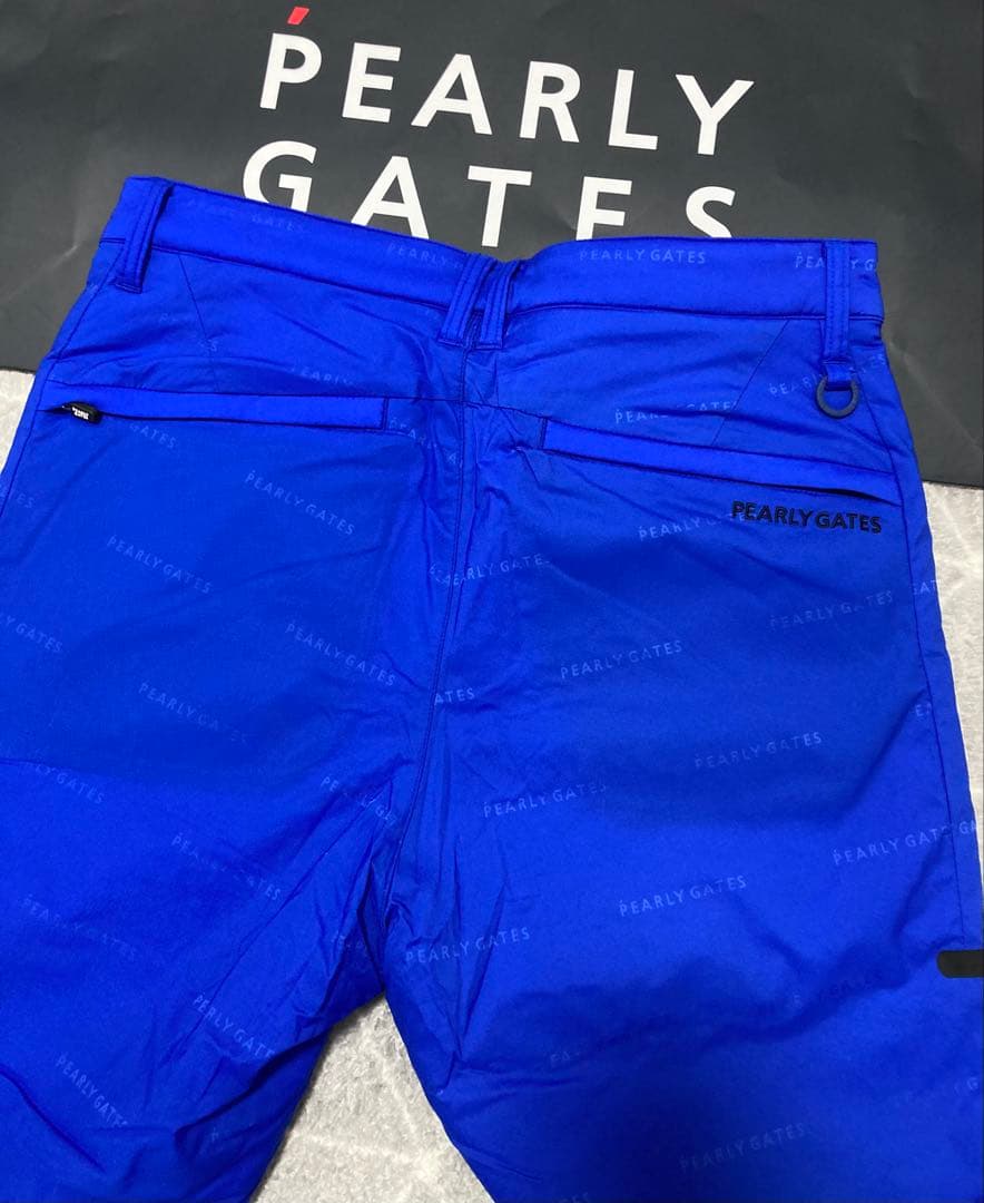 新品 パーリーゲイツ ナイロンストレッチロゴジャガード パンツ(5)サイズL/青