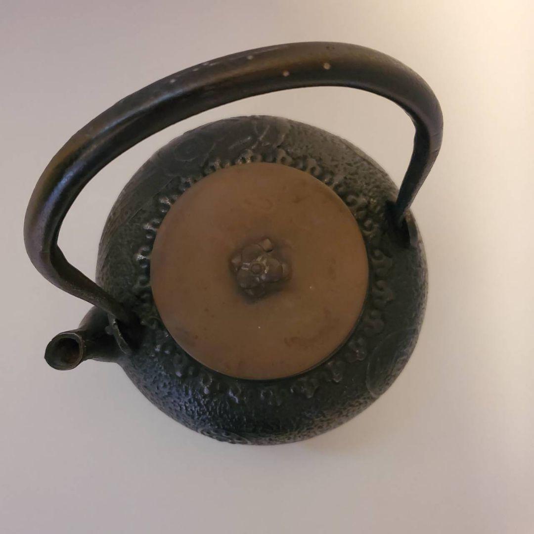 龍文堂　鉄瓶　古銭文様　取手銀象篏
