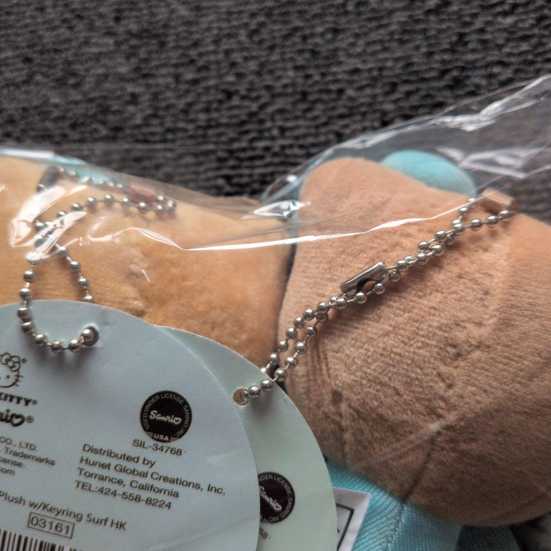 ハローキティ　日焼け　カハラホテル　ブルードレス　サーフボード　マスコット