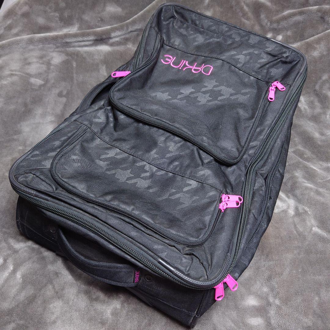 美品 DAKINE キャリーバッグ スーツケース 旅行バッグ ダカイン 黒ピンク