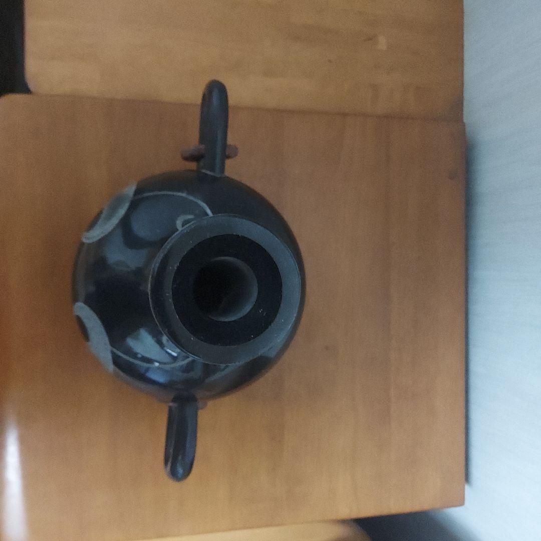 顔の形の黒色石製品置物25㎝