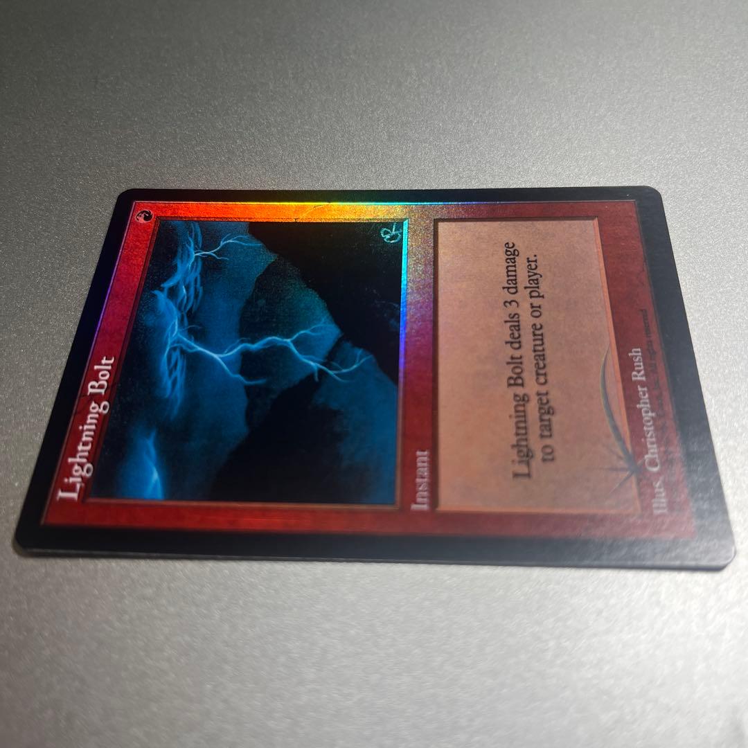 ③ MTG foil 《稲妻/Lightning Bolt》(ジャッジ褒賞)旧枠