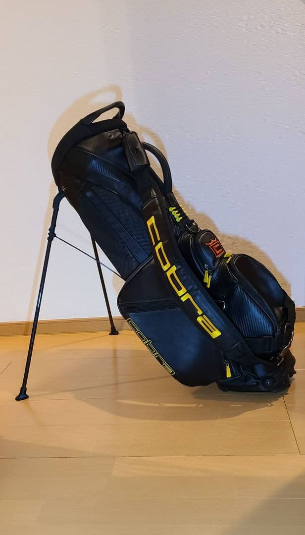 コブラ　ベゼルコラボスタンドバッグ 黒/黄色