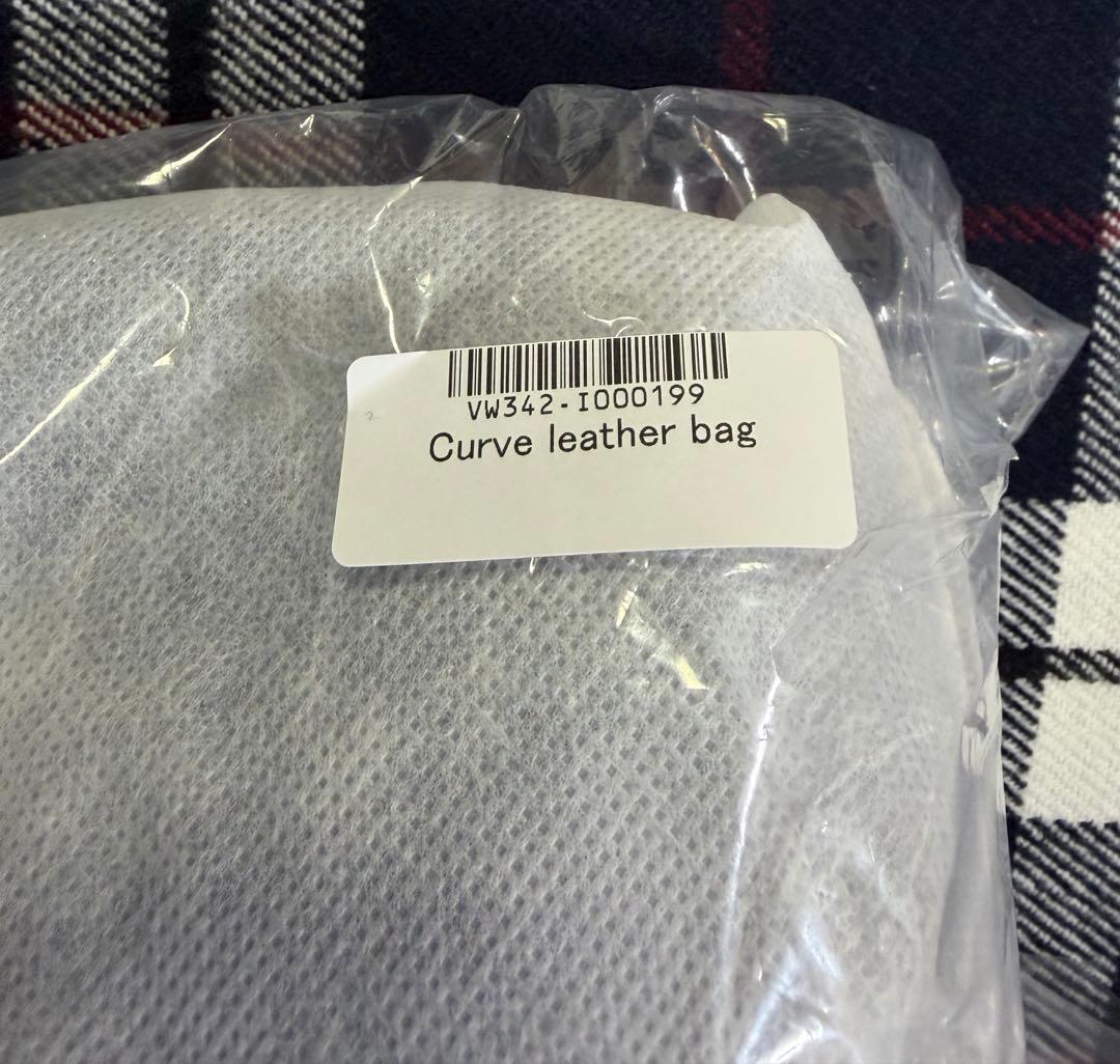 SULA カズタ　Curve leather bag n.SSign