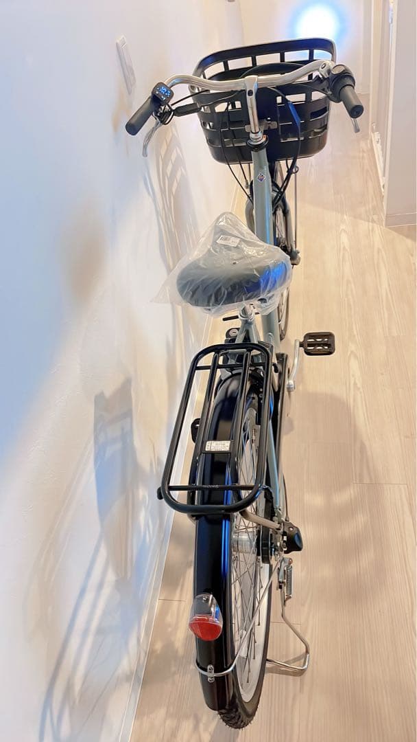 ブリヂストンの電動アシスト自転車、26インチ、ターコイズ。