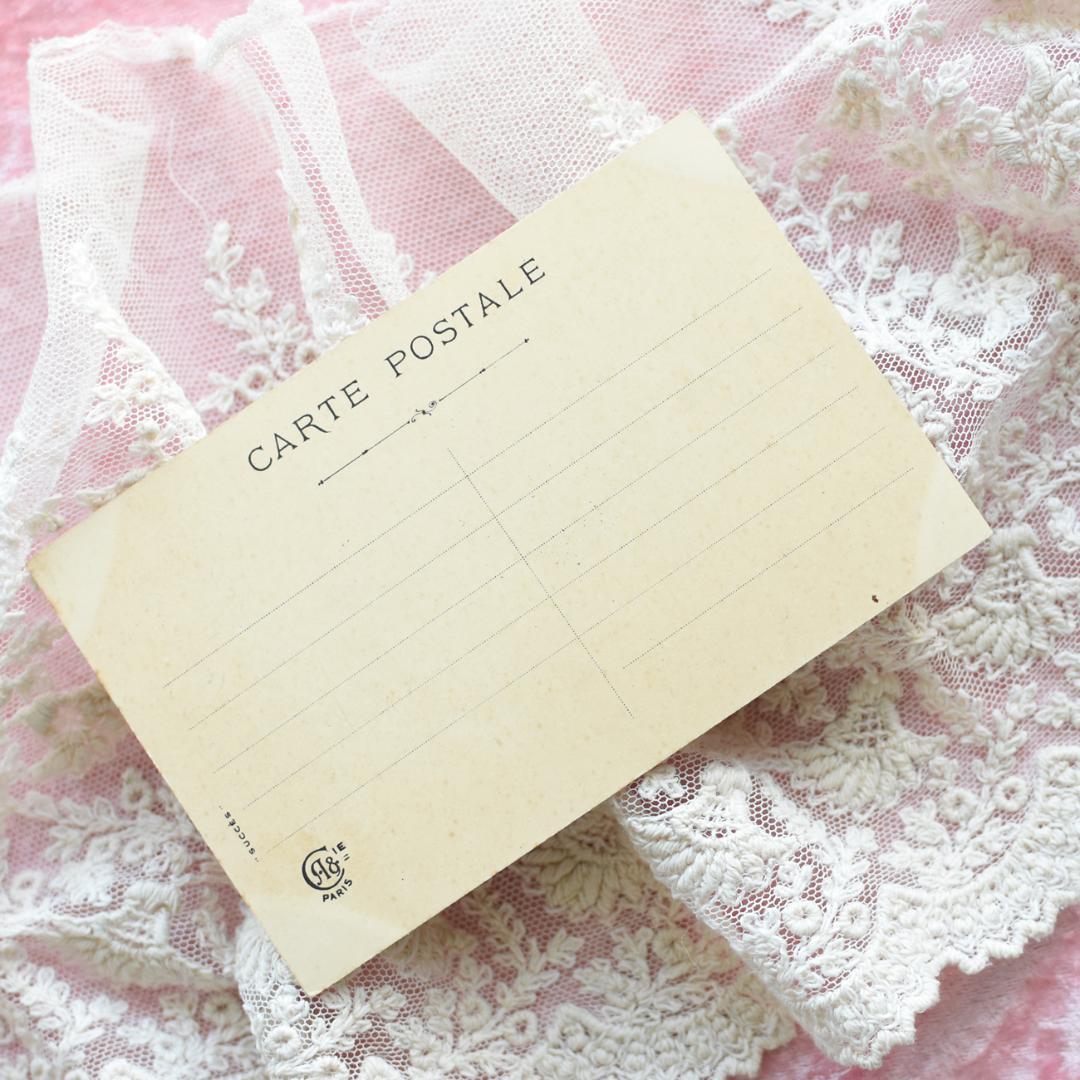 *アンティークポストカード　お人形と素敵な新年を迎える可愛い少女