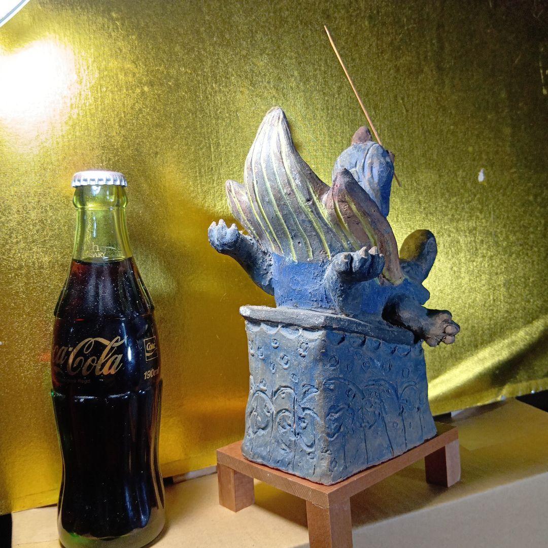 亀の上に立つ人物像 置物