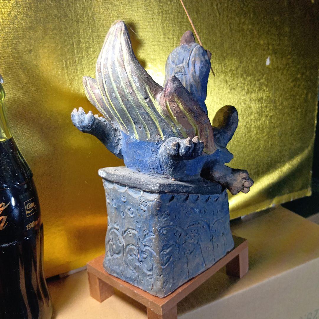 亀の上に立つ人物像 置物