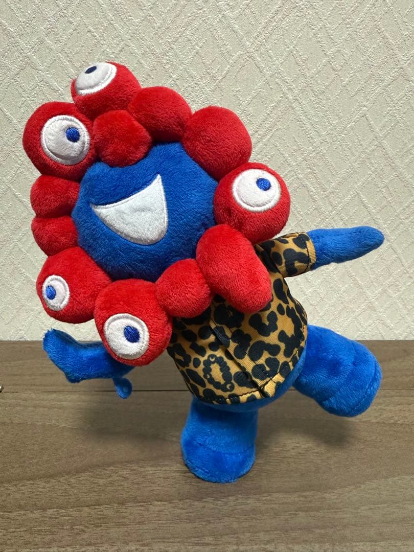 ミャクミャク　ポキポキぬいぐるみ　ヒョウ柄服付き