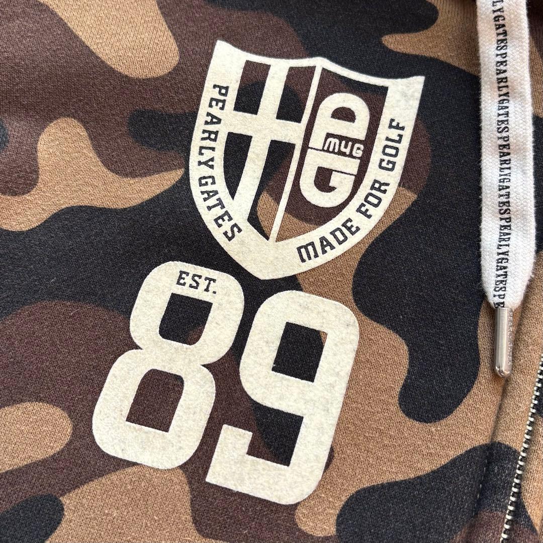 PEARLY GATES 迷彩カモフラ総柄 ジップフードパーカー にこちゃん刺繍