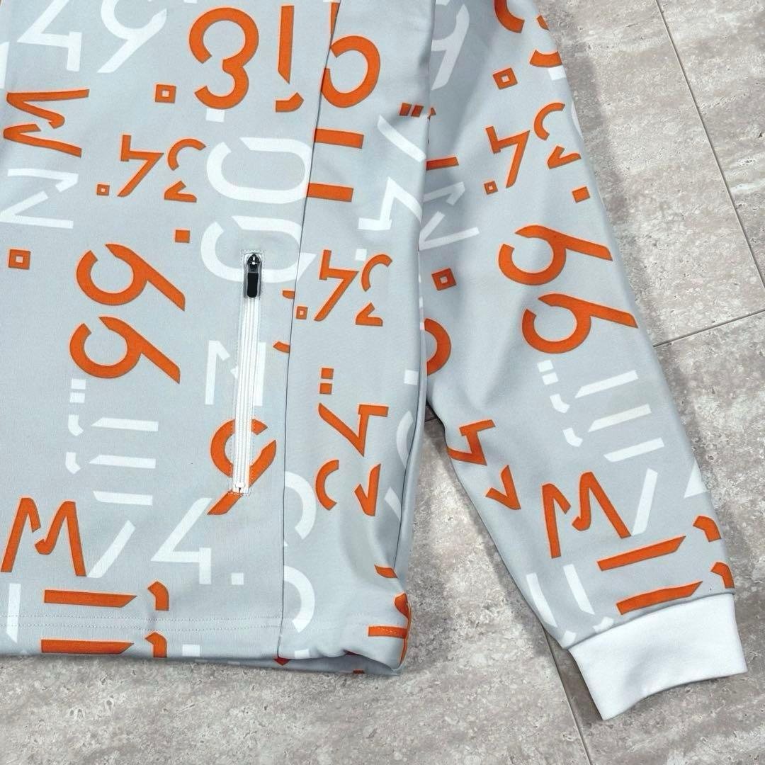 【マンシングウェア】ブルゾン　ジャケット　フーディ　総柄　軽量　グレー系