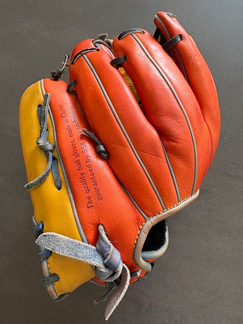 硬式野球グローブ 内野手用オレンジ イエロー